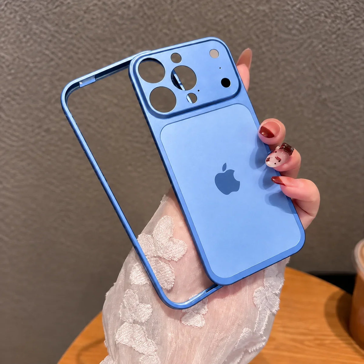 Sky blue iPhone 17 converter case held in hand